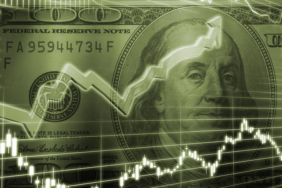 green-charts-behind-dollar-bill