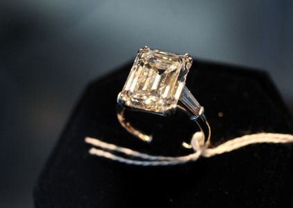 Ladies diamond engagement ring with one emerald-cut diamond weight 10.54 carat. Set in platinum, hand-made mounting with two baguette diamonds.

Photo: Bloomberg News)