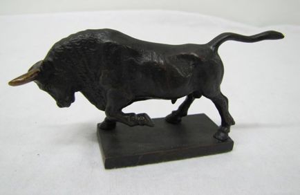 Minature bronze statue of a bull