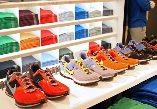 Buffett's company lowered its stake in the world's largest sporting-goods provider, by 52 percent in the third quarter to 3.6 million shares. [Photo: Bloomberg News]