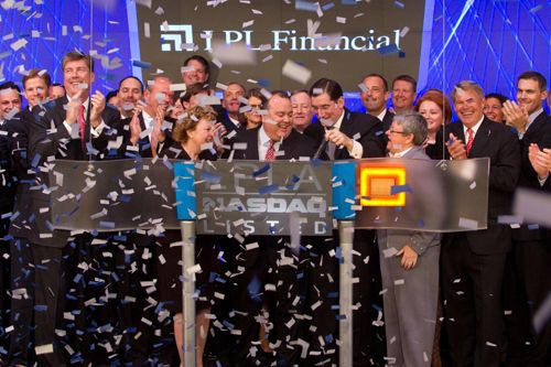 LPL executives and employees celebrate as the company officially lists on the NASDAQ