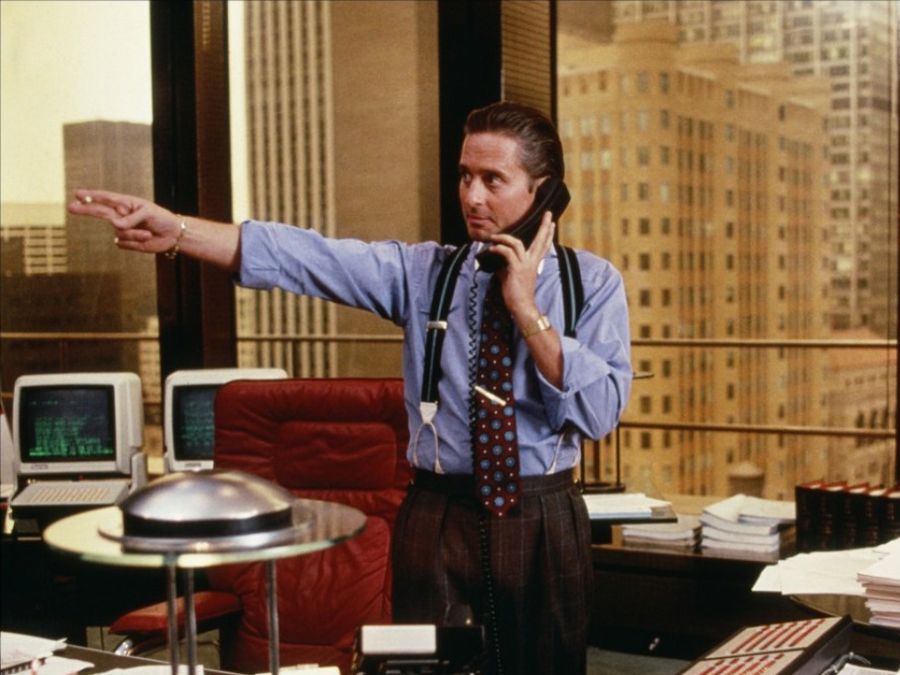 Gordon Gekko, a broker who believes “Greed is good.” is a character made famous by Michael Douglas. Charlie Sheen played a young stockbroker trying to make his mark on Wall Street, even if it meant following in the footsteps of Mr. Gekko.<br>
<b>Gordon Gekko:</b> "It's not a question of enough, pal. It's a zero sum game, somebody wins, somebody loses. Money itself isn't lost or made, it's simply transferred from one perception to another."
