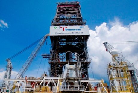 The New York-based fund added 17.3 million shares of Transocean Ltd., lifting its stake to 7.7 % — making Paulson the largest holder of the world's largest offshore driller. Transocean, the owner/operator of the Deepwater Horizon drilling rig that exploded in the Gulf of Mexico, was sued by BP Plc last month for damages related to the oil spill.  Transocean stock has dropped about 26% since the disaster. This month, the company reported its biggest 1Q profit decline in nine years.  (Photo: Bloomberg)