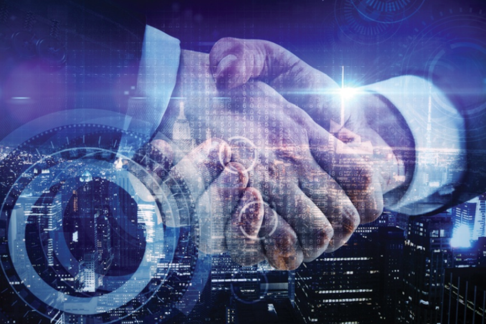 technology deal handshake