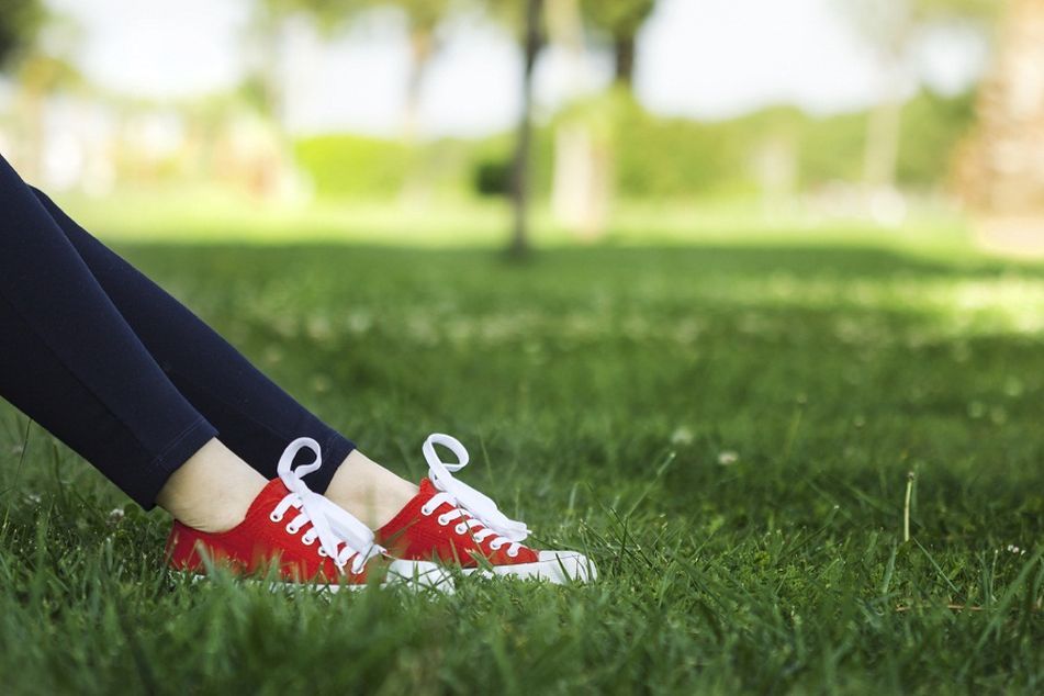 red sneakers grass