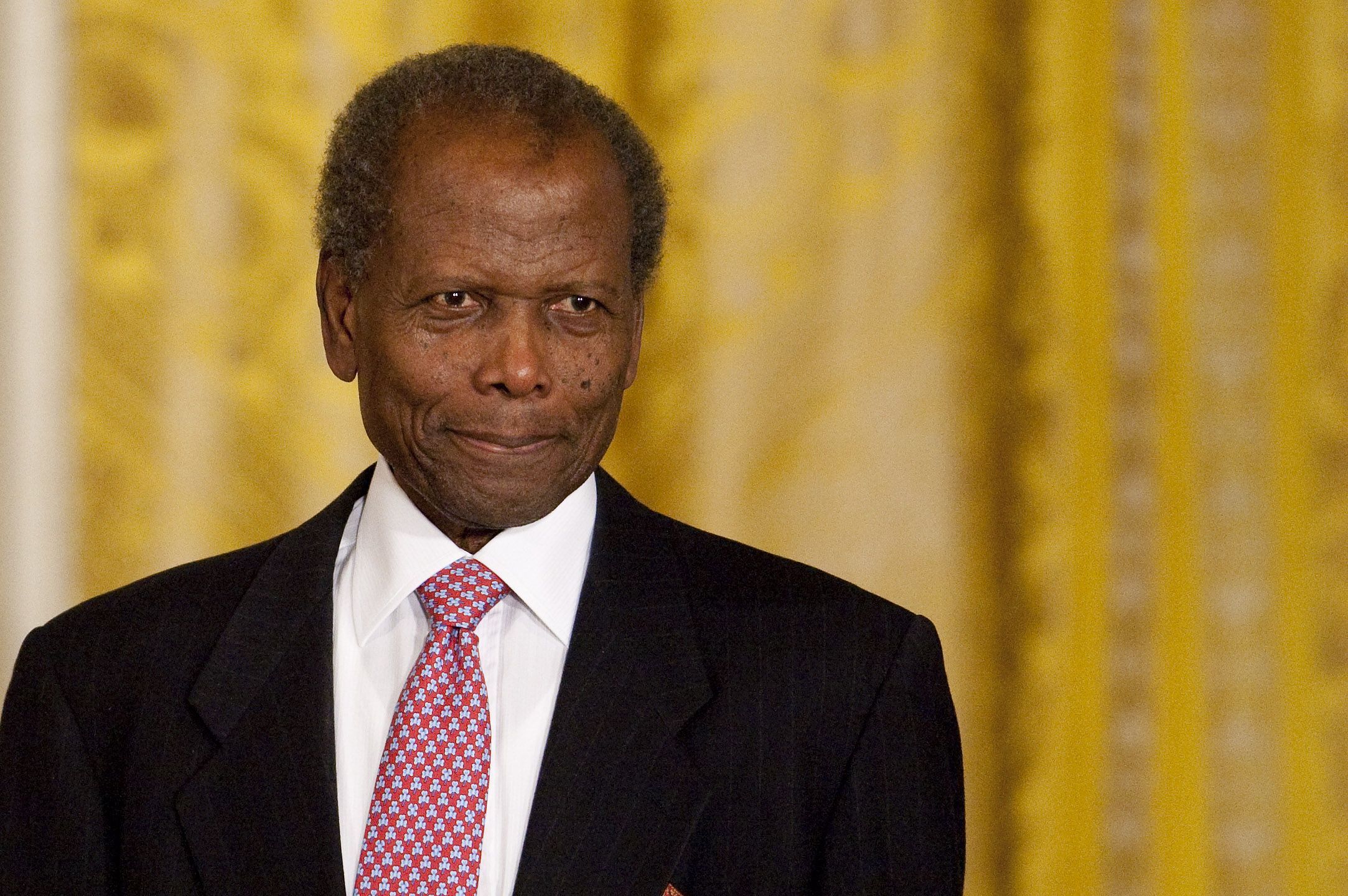 Actor Sidney Poitier arrives at the 2009 Presidential Medal of Freedom ceremony in the East Room of the White House in Washington, D.C., U.S.