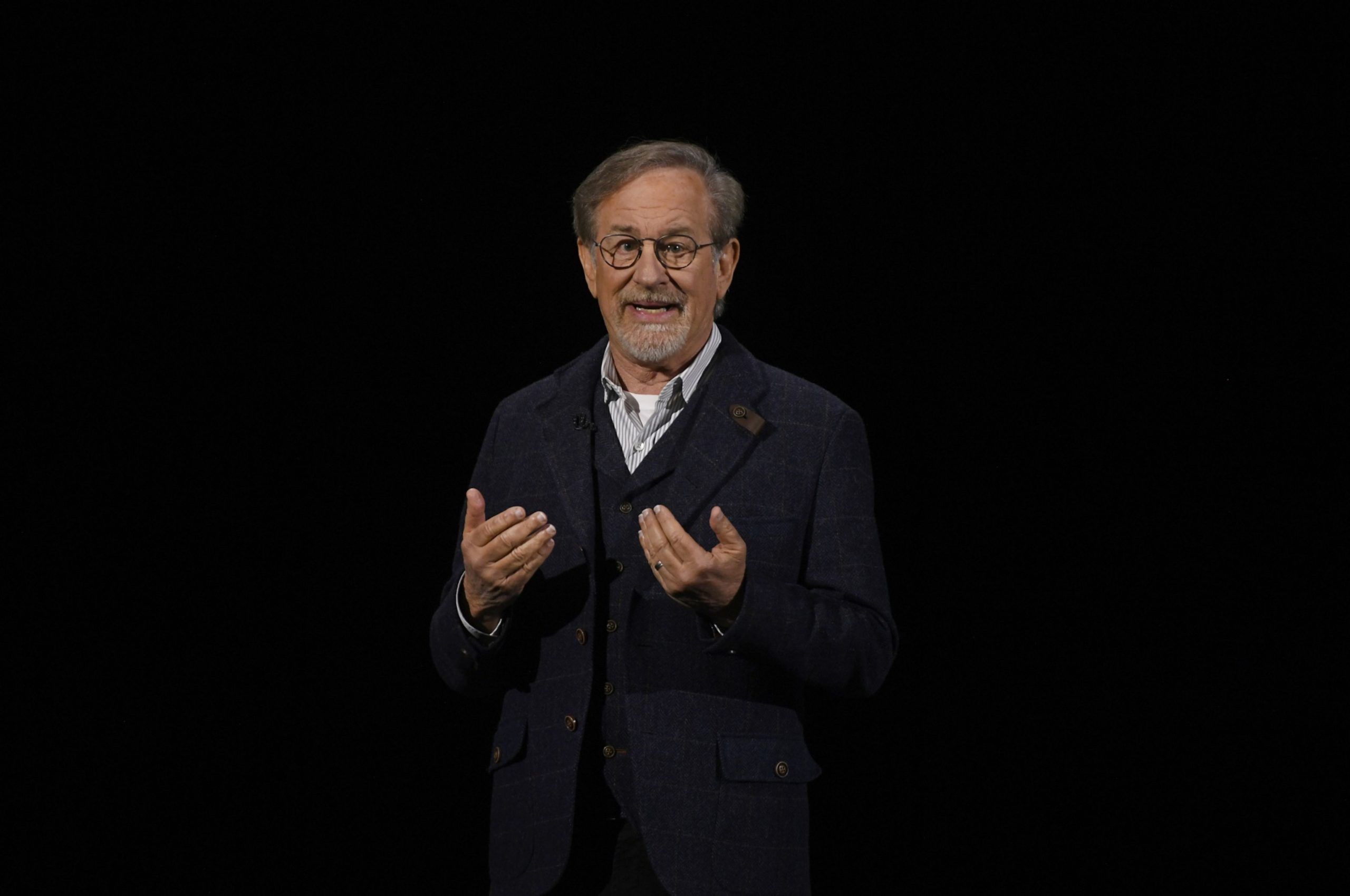 Filmmaker Steven Spielberg smiles during an Apple Inc. event 