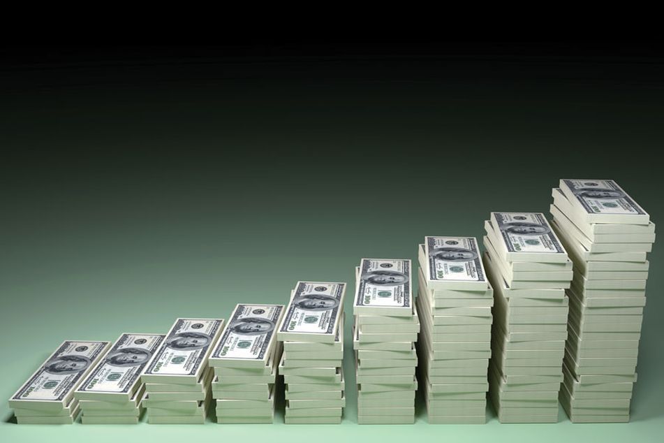 stacks-of-money-bills-increasing