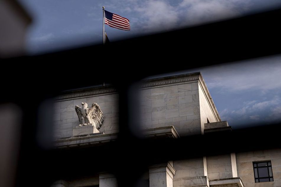 Federal-Reserve-building-seen-through-fence