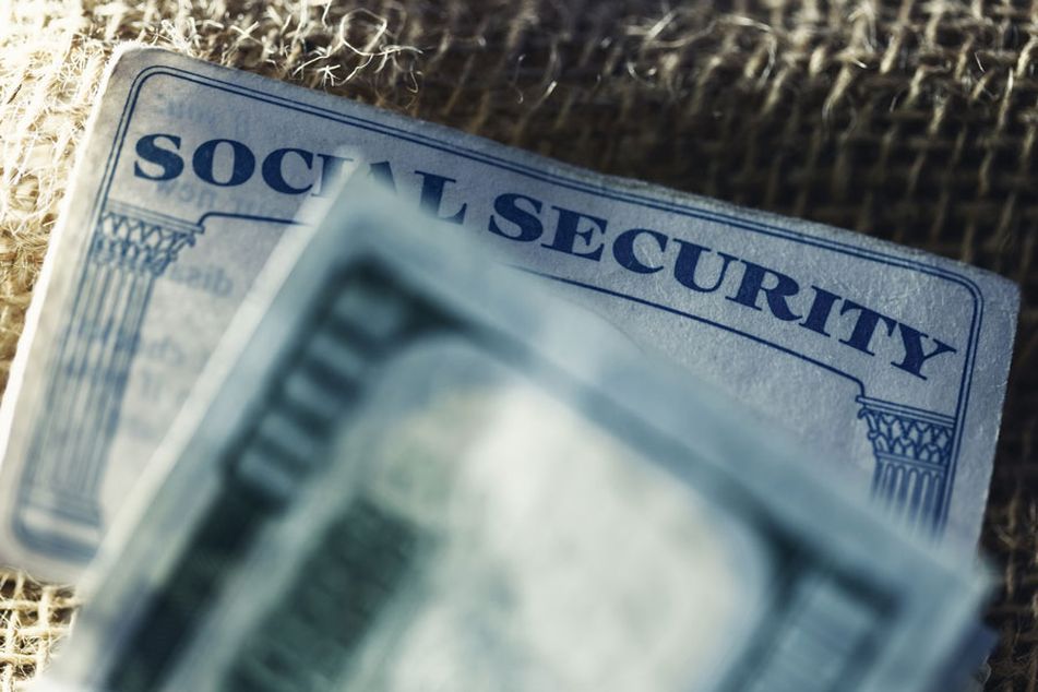 Social-Security-card-and-$100-bill