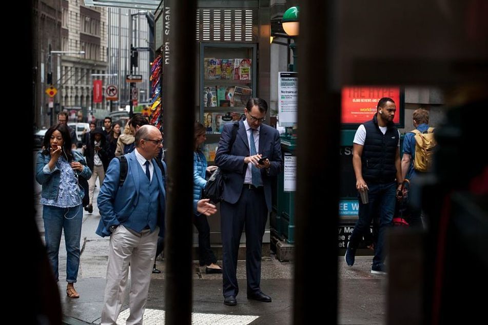 People-walking-on-Wall-Street