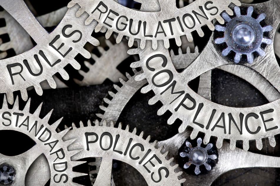 interlaced-wheels-labeled-regulations-compliance,policies