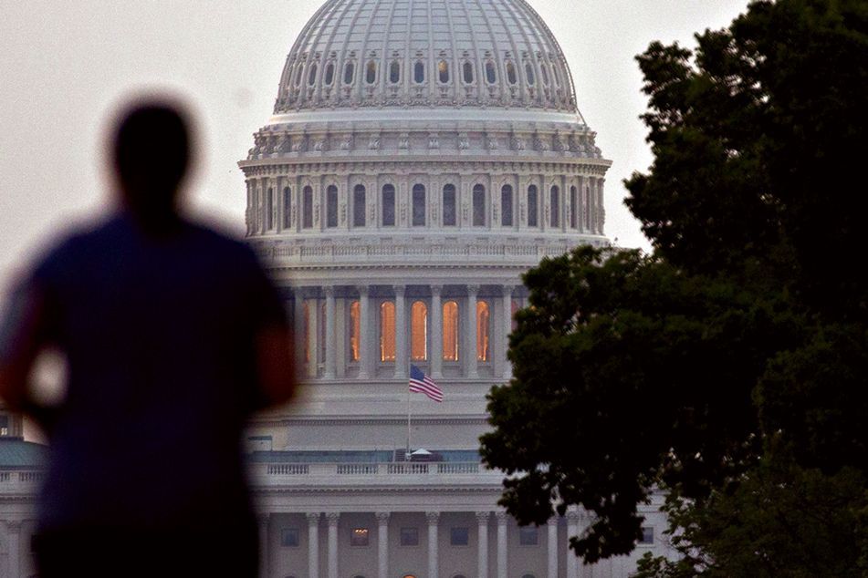 man-walking-toward-U.S.-Capitol