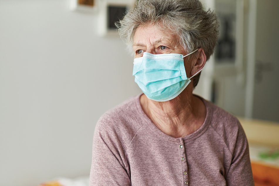 A retiree wears a face mask during the pandemic