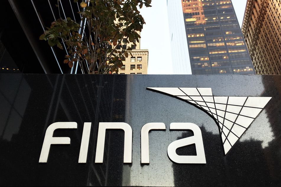 Finra-logo-amid-office-buildings