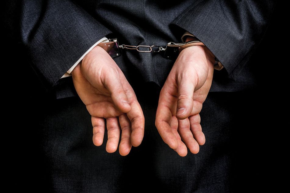 businessman-in-handcuffs