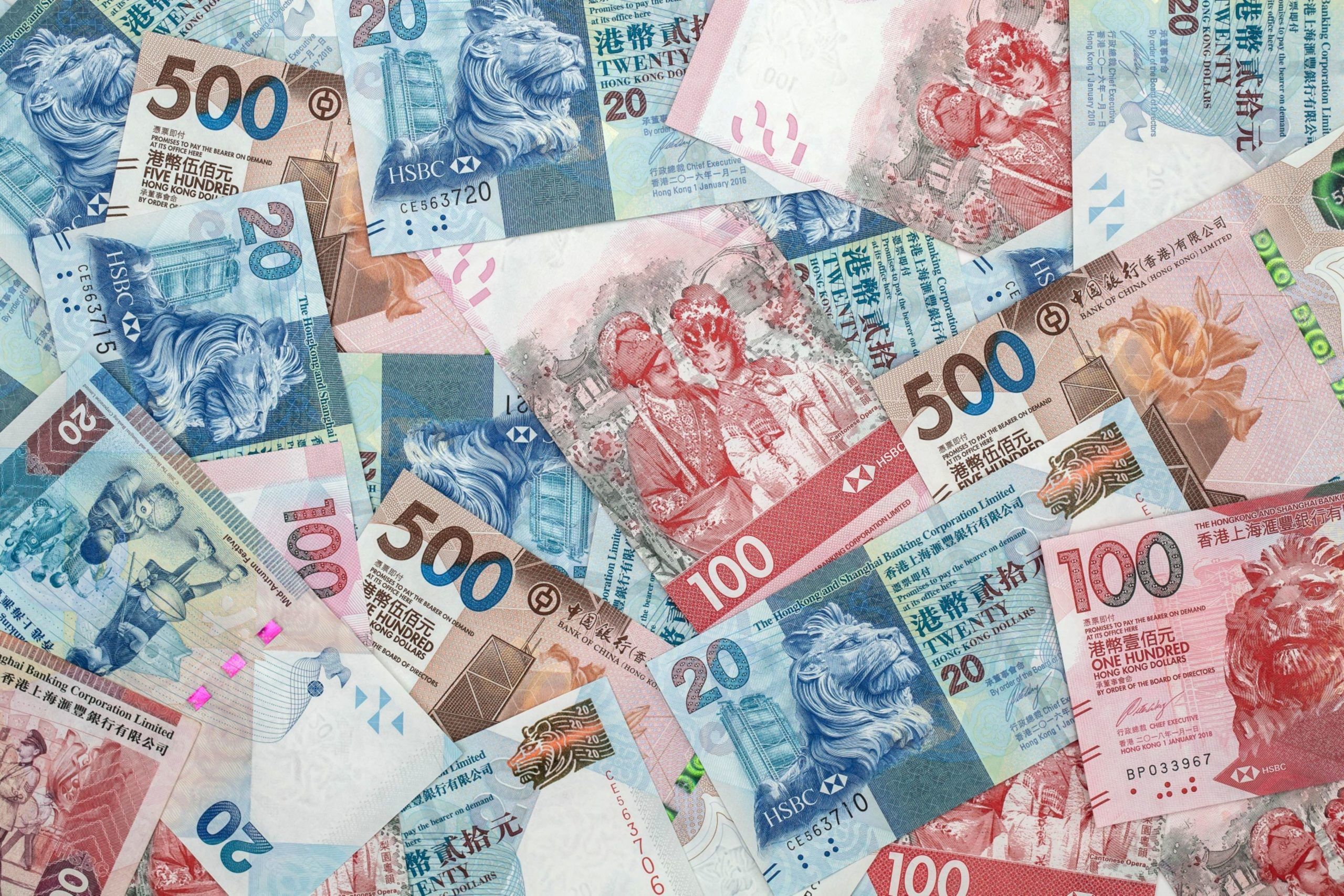 Hong Kong five-hundred, one-hundred and twenty-dollar banknotes in Hong Kong, China. Photographer: Paul Yeung/Bloomberg