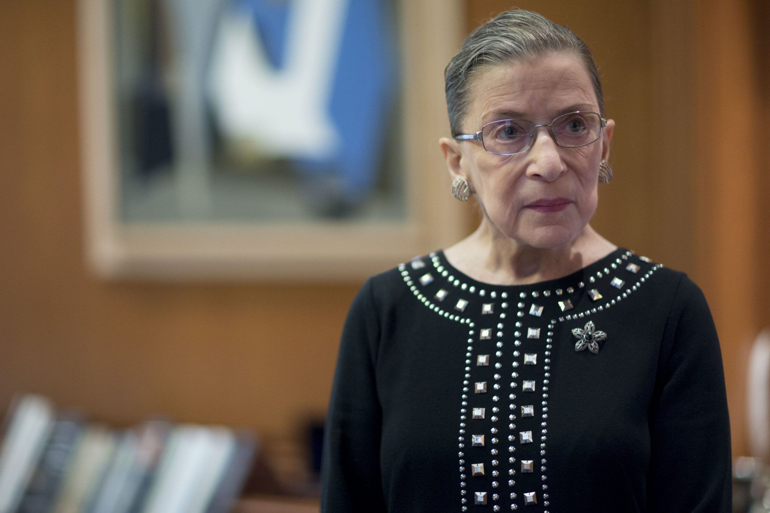 Ruth Bader Ginsburg, associate justice of the U.S. Supreme Court, stands in her chambers following an interview in Washington, D.C. 