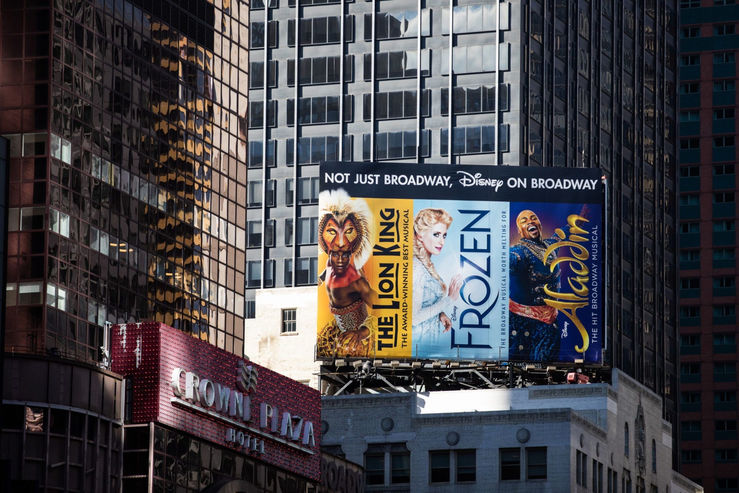 Billboards for Walt Disney Co. The Lion King, Frozen and Aladdin Broadway musicals stand on display in the Times Square area of New York, U.S., on Tuesday, May 12, 2020 during New York City's lockdown