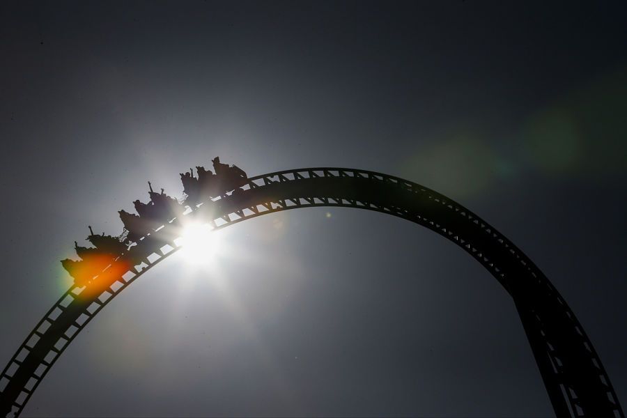 Visitors ride the Tatsu roller coaster at Six Flags Magic Mountain in Valencia, California, U.S., on Monday, April 20, 2015. Photographer: Patrick T. Fallon/