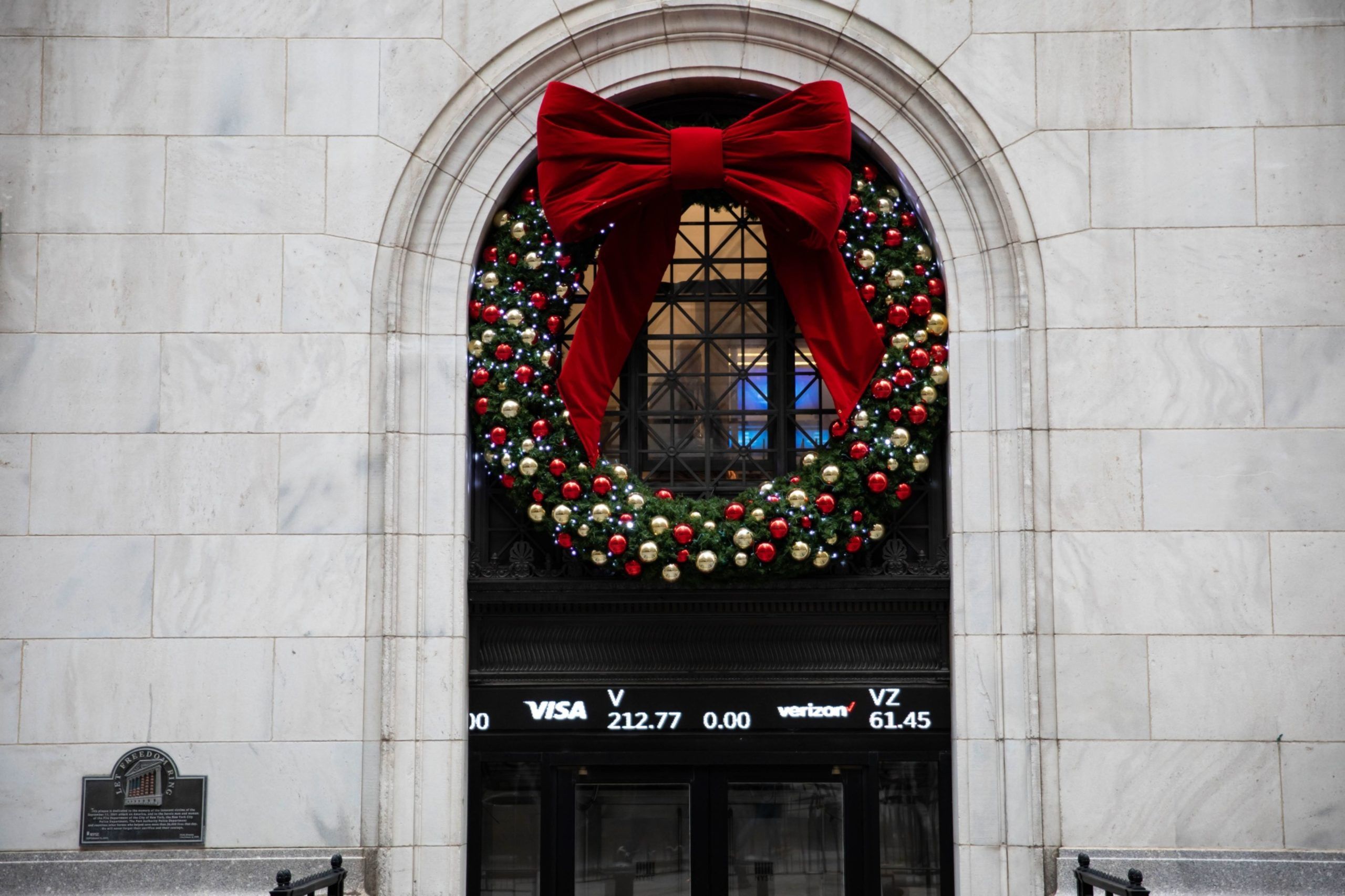 A holiday wreath outside the New York Stock Exchange (NYSE) in New York, U.S., on Wednesday, Dec. 9, 2020. 