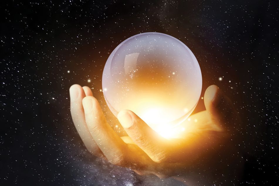 hands-holding-a-crystal-ball