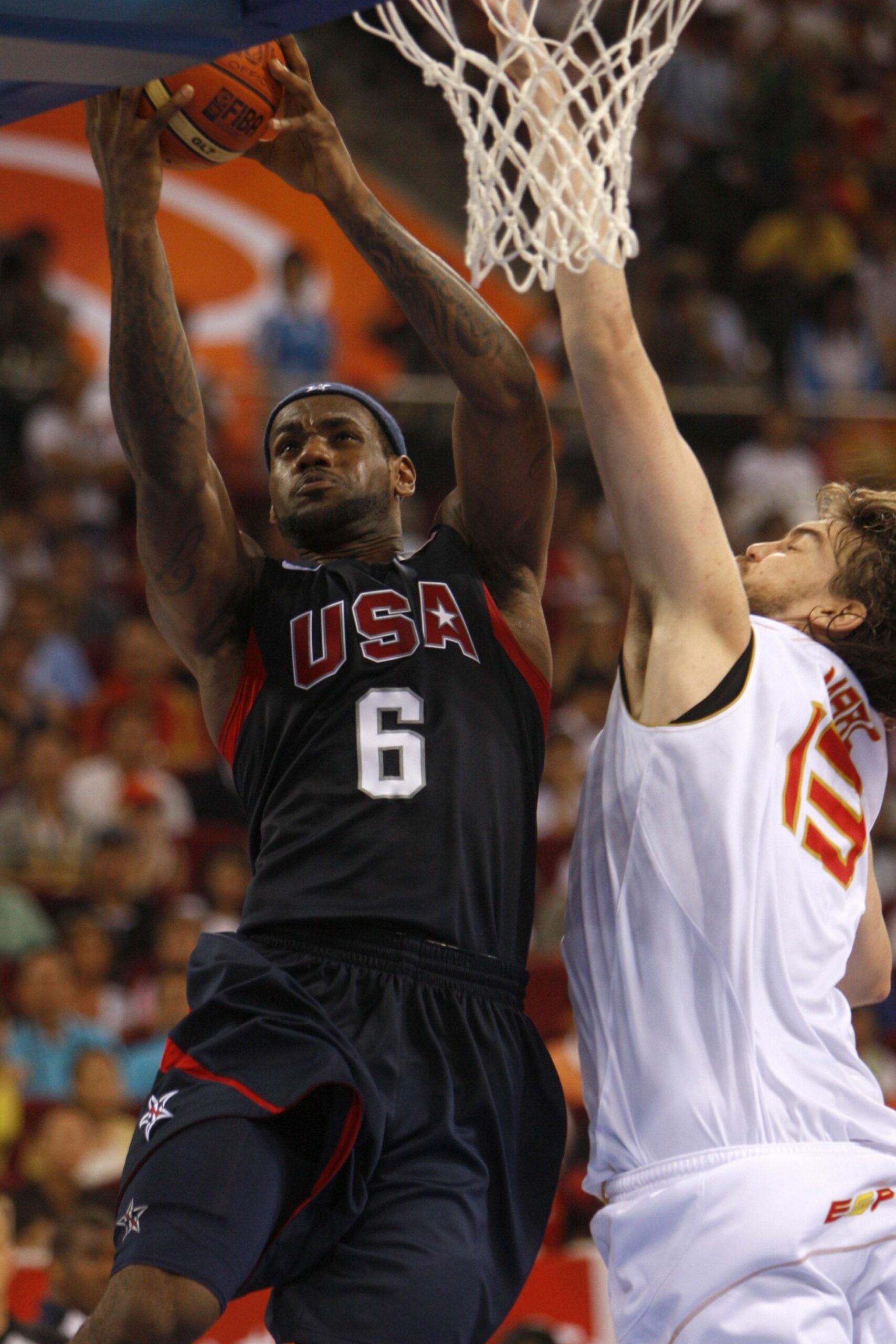 Lebron James of the U.S., left, goes up for a basket against Marc Gasol of Spain, in the final game of the men's basketball event on the final day of the 2008 Beijing Olympics in Beijing, China, on Sunday, Aug. 24, 2008. Kobe Bryant and his National Basketball Association colleagues defeated Spain 117-108 to reclaim the championship the U.S. lost four years ago in Athens after leading by just two points in the fourth quarter. Photographer: Nelson Ching/Bloomberg News