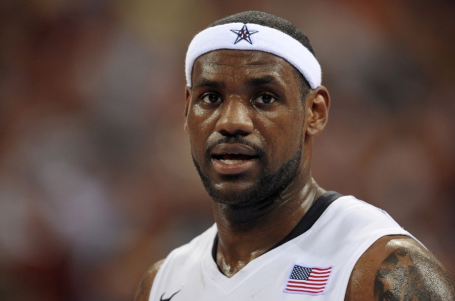 Lebron James of the U.S., pauses during their game against Australia in the men's basketball quarterfinal event on day 12 of the 2008 Beijing Olympics, in Beijing, China, on Wednesday, Aug. 20, 2008. The U.S. defeated Australia 116-85. Photographer: Victor Fraile/BPI via Bloomberg News