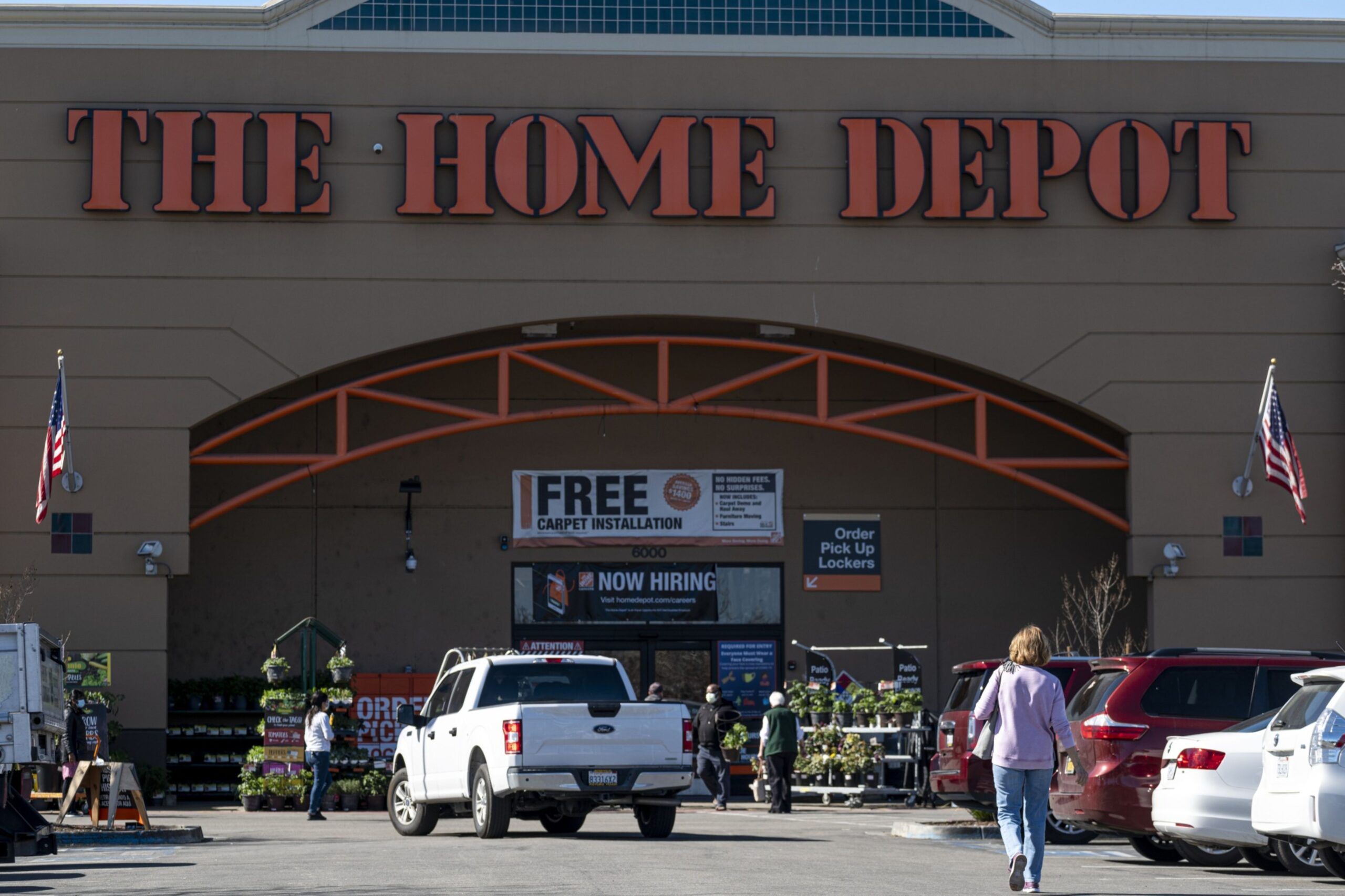 Shoppers enter a Home Depot store in Pleasanton, California, U.S., on Monday, Feb. 22, 2021. Home Depot Inc. is expected to release earnings figures on February 23. Photographer: David Paul Morris/Bloomberg