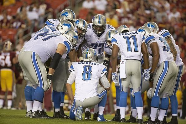 Football: Rear view of Detroit Lions QB Dan Orlovsky (8) in huddle with teammates during preseason game vs Washington Redskins at FedEx Field.
Landover, MD 8/20/2015
CREDIT: Simon Bruty (Photo by Simon Bruty /Sports Illustrated/Getty Images)
(Set Number: X159867 TK1 )