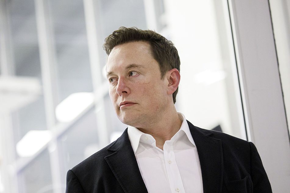 Elon Musk in dark suit