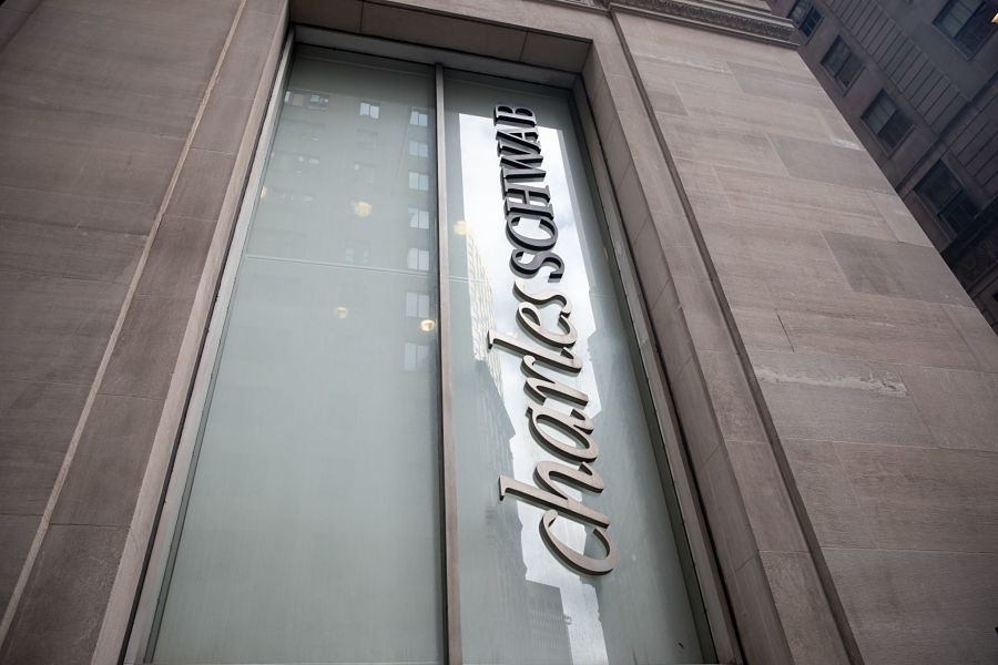 Signage is displayed outside a Charles Schwab Corp. location in New York, U.S., on Monday, Oct. 14, 2019. Charles Schwab is scheduled to release earnings figures on October 15. Photographer: Michael Nagle/Bloomberg